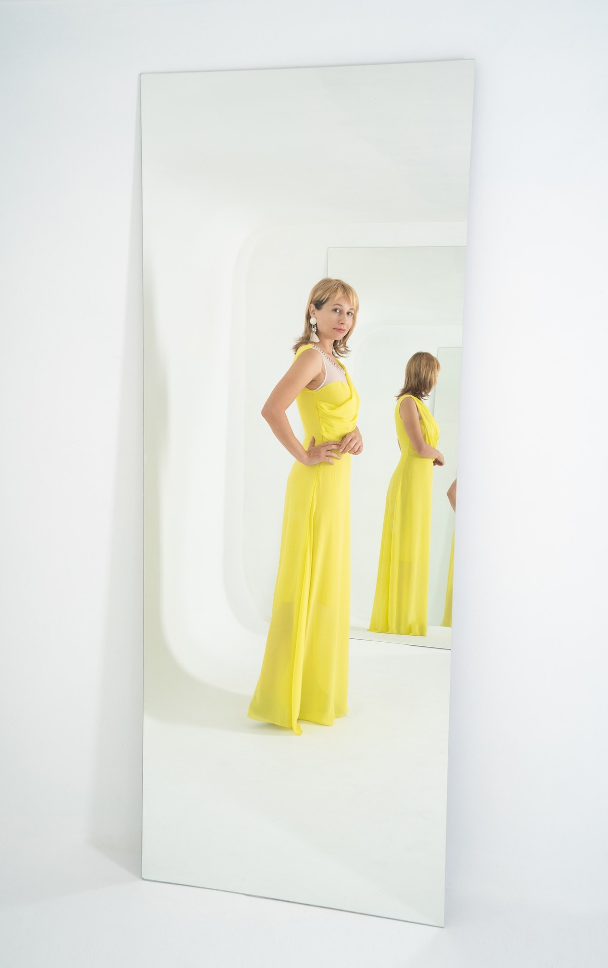 pose in the mirror yellow dress